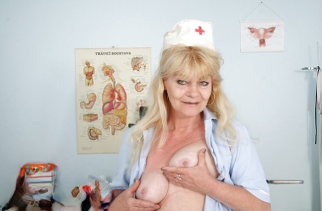 Filthy Granny In Nurse Uniform Masturbating Her Twat With Toys
