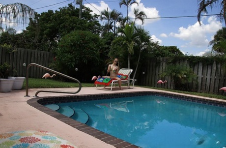 Pretty amateur babe Madison Chandler stripping by the pool