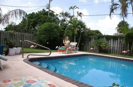 A young and average Madison Chandler was caught stripping by the pool.