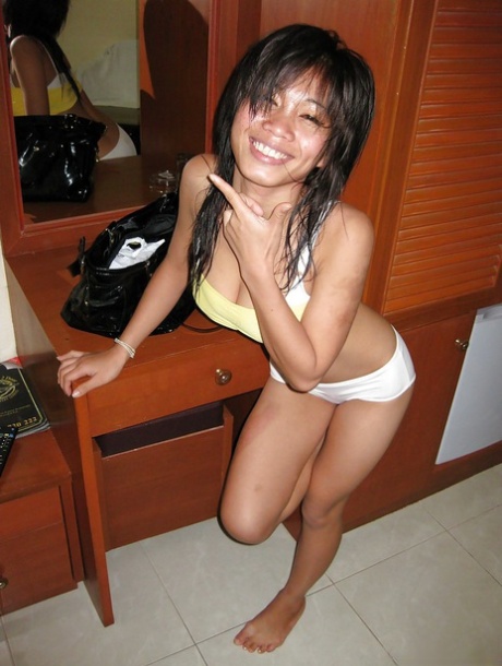 A hot, attractive Asian girl who strips and gets hardcore.