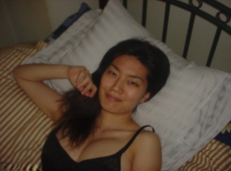 These are just some of the most endearing sightlines one can come across: A seductive asian babe slips off her clothes and shows off her big tits, while also being