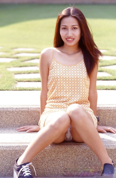 Asian beauty: The girl with a plump body spreading her thin legs.