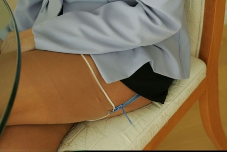 In revealing stockings, attractive female lesbians are slowly stripping off.