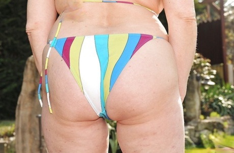Chubby Mature Brunette Helena May Slipping Off Her Bikini Outdoor