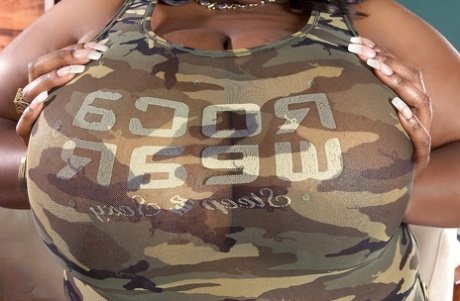 The black bbw female, Simone Fox, flaunting her massive hooters.