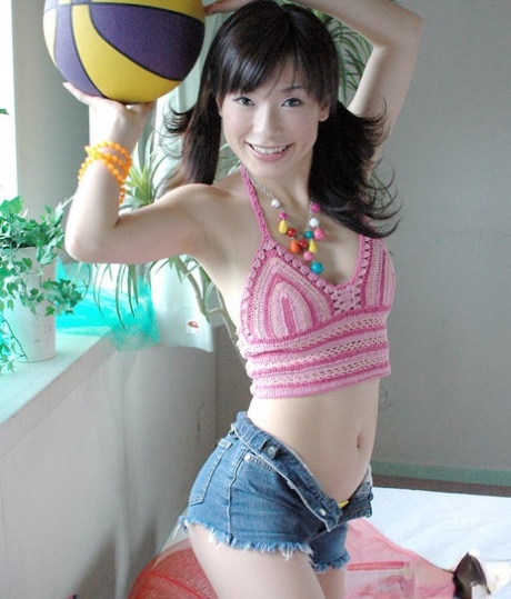 Stunts: This is the world'first picture of an asian babe in stockings, with her gorgeous curves.