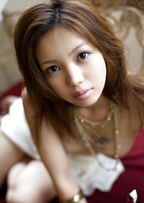 A cute and petite Asian woman, Yura Aikawa.