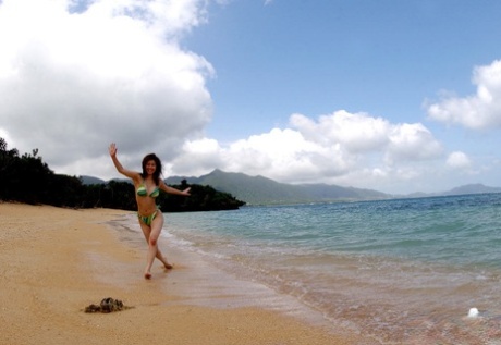 Adusa Kyono, a busy Asian woman, was caught slipping off her bikini outdoor clothing.