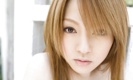 Exposed: Asian sex, Ria Sakurai, poses in public with her beautiful body and gorgeous curves exposed.