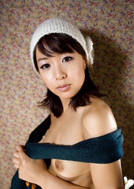 Pretty asian babe Nana Nanami showing off her seductive curves