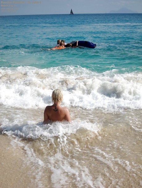 Naked amateur teenage babes in sunglasses having some fun on the beach