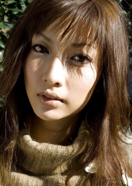 Lovely asian teenage babe slowly taking off all of her clothes