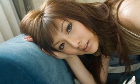 Lovely asian teenage babe slowly taking off all of her clothes