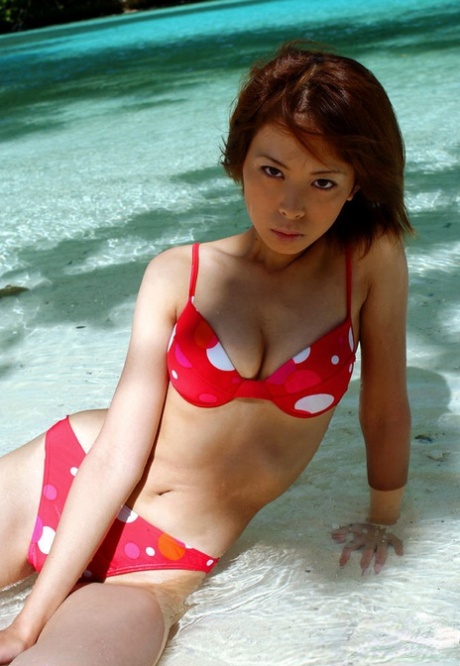 In his lingerie, Minami Aikawa is an attractive Asian babe with stunning looks.