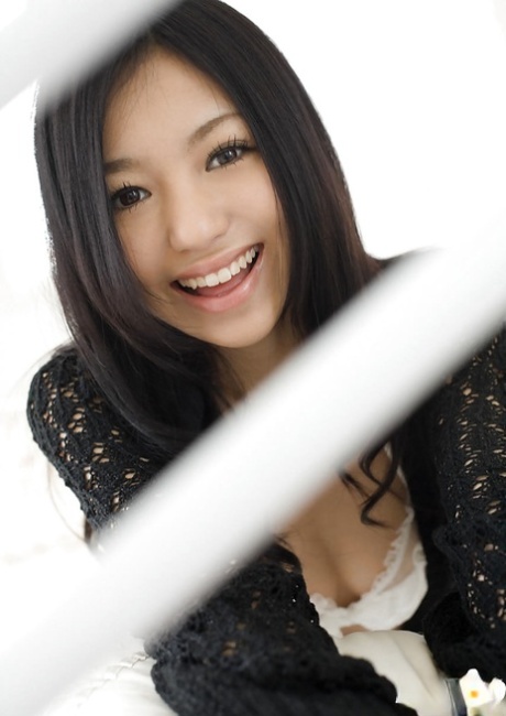 Sweet Asian vixen Aino Kishi exposing her tiny curves.