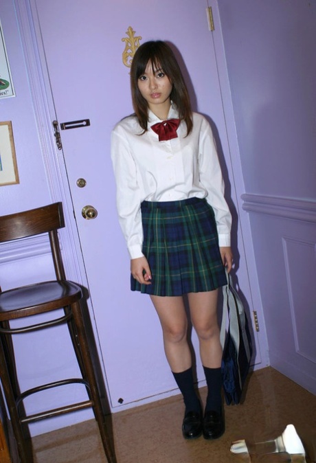 Hikaru Koto, an naughty Asian schoolgirl, was seen slipping off her uniform.