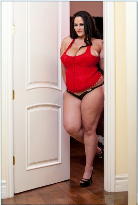 The red corset of BBW wife Carmella Bing and the stripping of her big tits.
