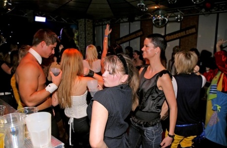 Salive amateur girls engage in sexual activity with male strippers at the party.
