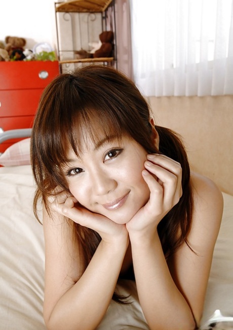 Asian teenage babe Maki Hoshino uncovering her petite curves