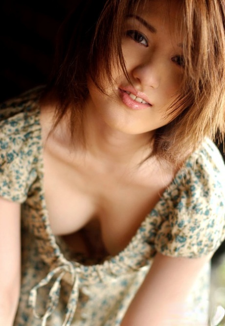 The naughty Asian female was seen taking off her dress and lacy panties.
