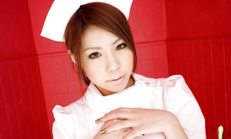 Disguised: Busy Asian nurse Haruka Sanada stripping off her uniform and lacy panties.