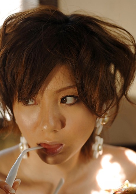 Full-bosomed asian babe Yuma Asami slipping off her underwear