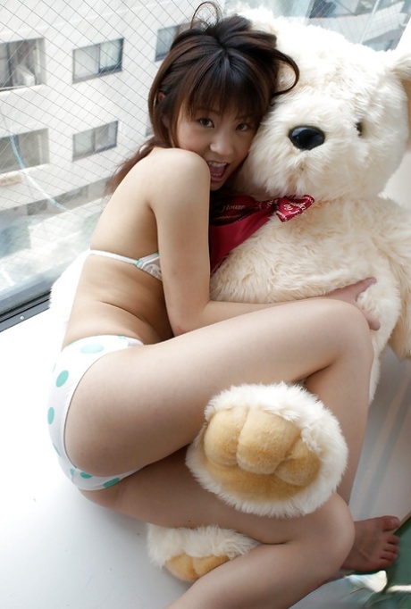 Asian teen in bikini Haruka Tsukino flashing her titties and hairy pussy