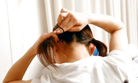 Teasing her hair in a sporty cunt and getting bound, Mie Matsuoka, the athletic Asian sexler, shows off her curling skills.