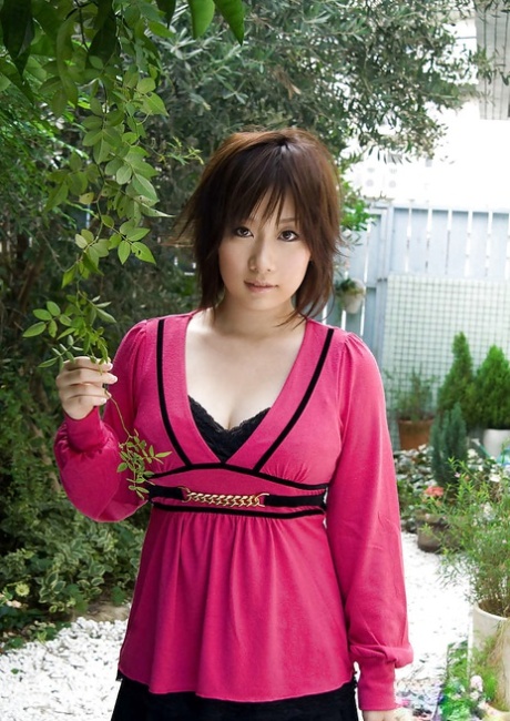 Asian coed Hanano Nono slowly revealed her remarkable large breasts.