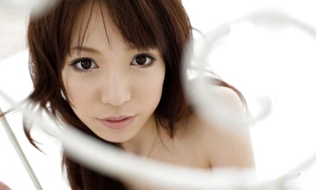 Kanako Tsuchiya, the Asian hotspot, was spotted stripping from her clothing.