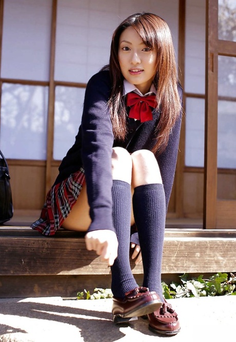 Misa Shinozaki, a schoolgirl from Asia, playing with her cooter beneath her panties.