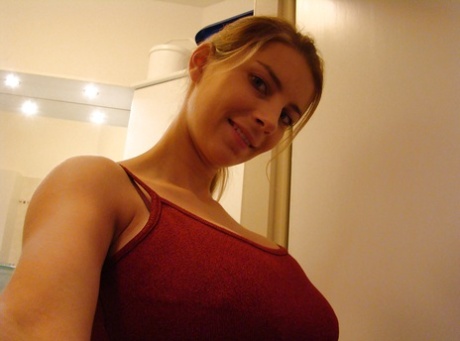 Stunning Teen With Huge Natural Tits Slowly Getting Rid Of Her Clothes