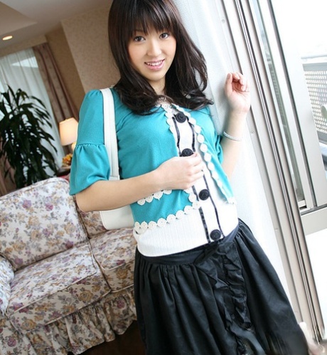 A frisky Asian babe with long, hard-nipped bellies on display.
