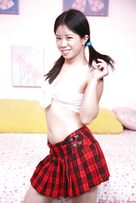 Exposed young Asian girl Asia Zo with her puffy nipples, getting naked?