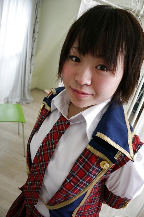 With her attractive buttocks and inviting gash, Mayu Nakane is an Asian schoolgirl.