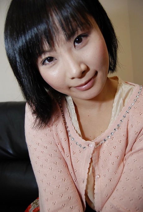 Asian Babe Minori Nagakawa Stripping Down And Exposing Her Hairy Cunt