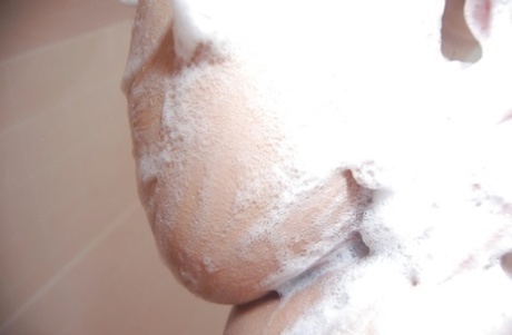 A sexy Asian male with curves and bellies named Chisato Ito showering.