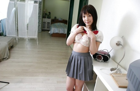 Adorable Asian Teen Satsuki Ejiri Undressing And Showcasing Her Pink Pussy