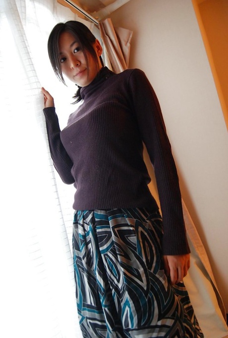 Asian MILF Ryoko Morikawa Undressing And Exposing Her Hairy Gash In Close Up