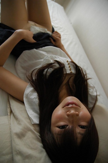 Chilling: Asian babe Shimomura Haruka, left, undressed with her mouth open and gash on the chest in close-up.