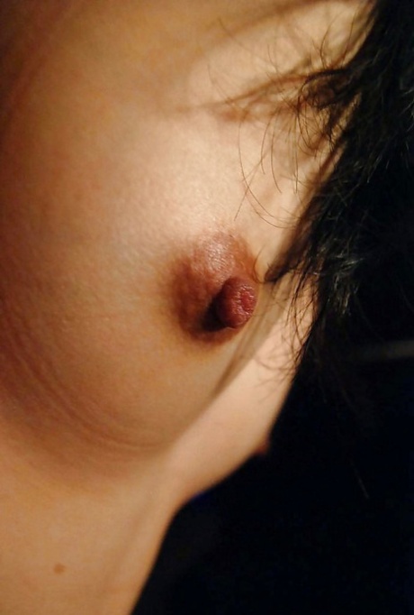 Asian teen Hinako Muroya undressing and exposing her goods in close up