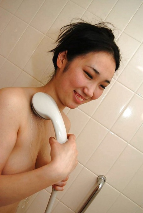 Shy asian teen with nice titties Shiori Usami taking shower