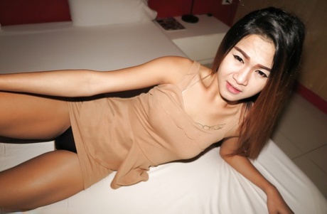 Slender Thai teen Ladyboy Jenn with butt cheeks spread wide for BB anal