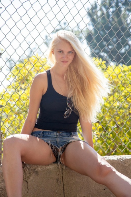 Blonde Amateur Dasha Krasova Flaunts Her Ass After Stripping To Her Underwear