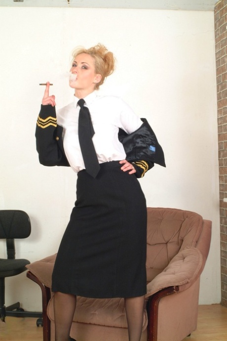Attractive Stewardess Katarina Strips Her Uniform & Plays With Her Tits