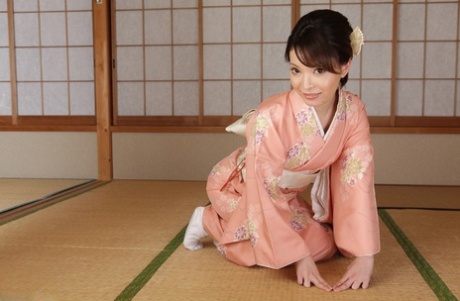 Japanese wife Hikaru Kirishima takes off her robe and is sexually assaulted by several men.