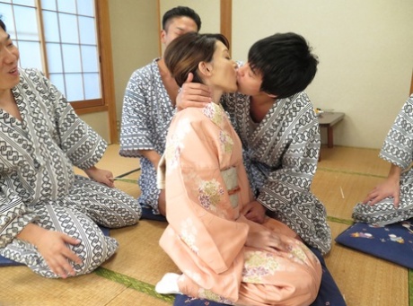 The Japanese wife, Hikaru Kirishima, takes off her robe and is bested by multiple males.