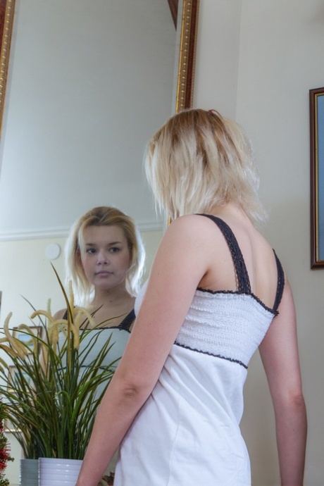 Blonde teen Elen shows her tiny tits, yummy butt and hairy vagina on the floor