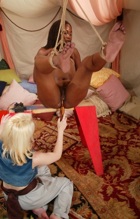 As she engages in rope bondage sex, blonde lesbian Cowgirl toys her partner Sia an inflatable (pictured) with the assistance of dildo.