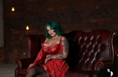 Chubby green haired babe Galda Lou reveals her melons and poses in lingerie